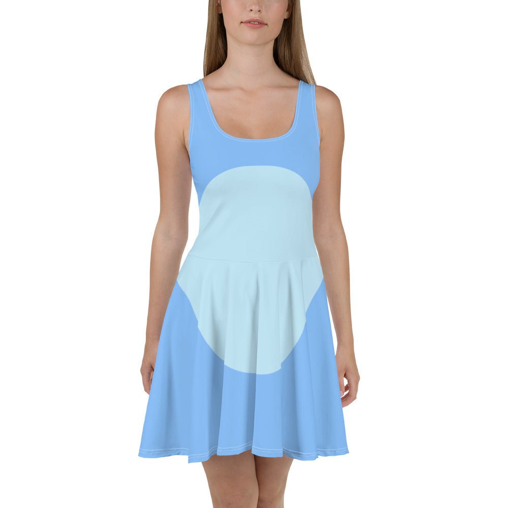 our model wears a blue heeler inspired dad skater dress from the beloved blue dog children's show. 